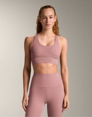 OYSHO Medium-support comfortlux sports bra with cups in pink
