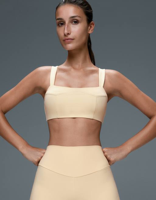 OYSHO Medium-support comfortlux sports bra with seams in cream, 3 of 5