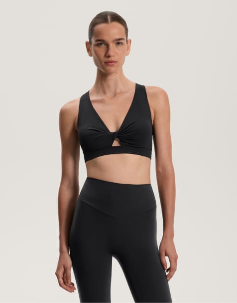 OYSHO Medium support twist comfortlux sports bra with cups in black - view 1