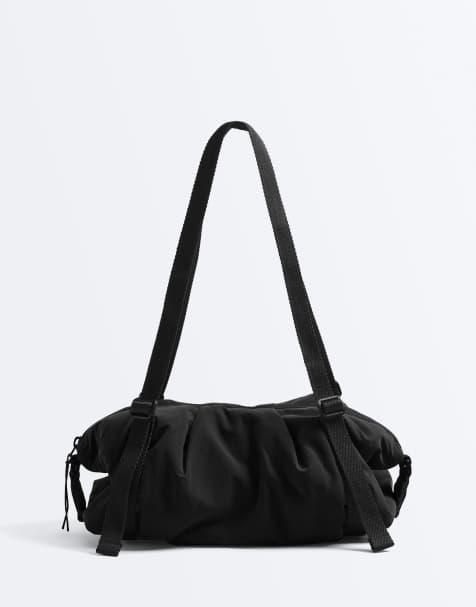 OYSHO Mini crossbody bag in black - view 1