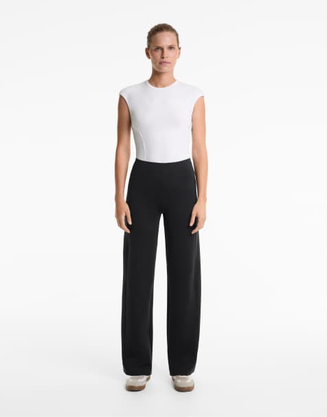 OYSHO Neoprene-effect straight-leg trousers in black - view 1