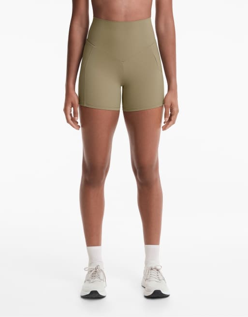 Oysho – Olivgröna hotpants med kompression, ficka och hög midja, 10cm