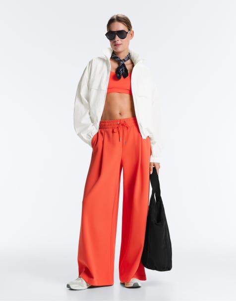 OYSHO – Orange, plisserade byxor i bomullspiké med vida ben - view 1