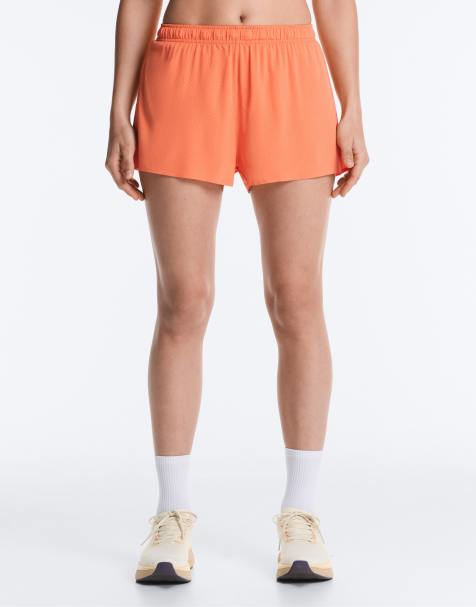 OYSHO – Orange shorts i tech-material med medelhög midja, 7cm - view 1