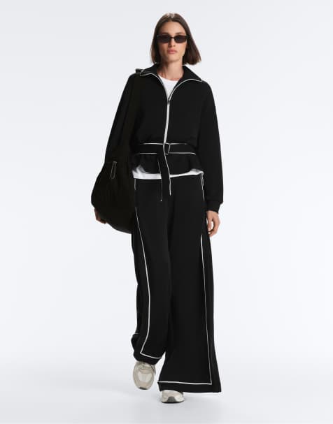 OYSHO - Pantalon ample en modal doux au toucher avec passepoil contrastant - Noir - view 1