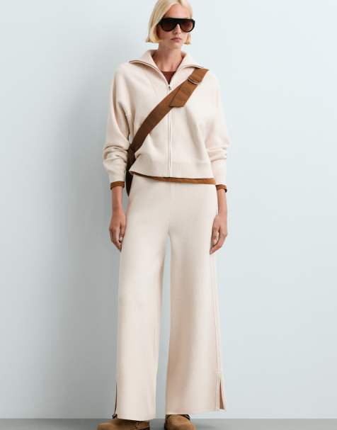 OYSHO pantaloni a gamba larga con profili a contrasto color avorio écru - view 1