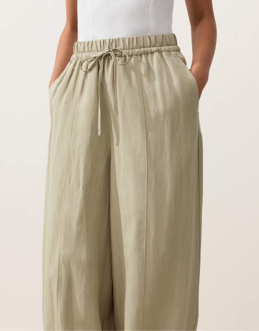 OYSHO - Pantaloni a palloncino beige in misto lyocell e 24% lino con cuciture, 2 di 4