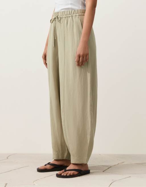 OYSHO - Pantaloni a palloncino beige in misto lyocell e 24% lino con cuciture, 3 di 4