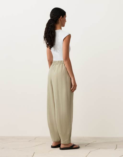 OYSHO - Pantaloni a palloncino beige in misto lyocell e 24% lino con cuciture, 4 di 4