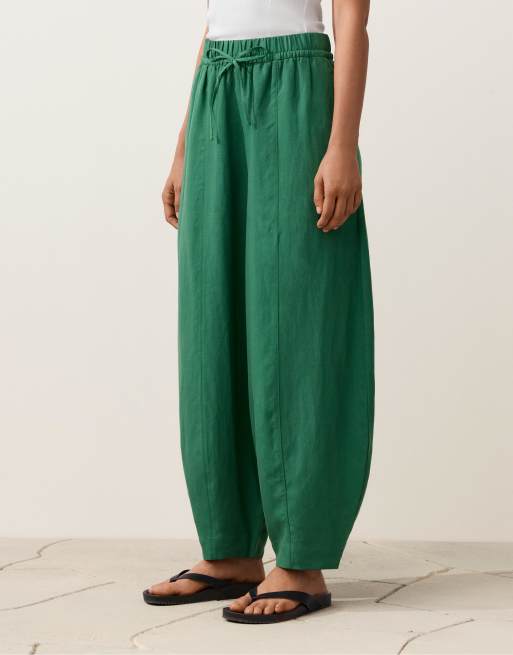 OYSHO - Pantaloni a palloncino in misto lyocell e 24% lino con cuciture verdi, 2 di 4