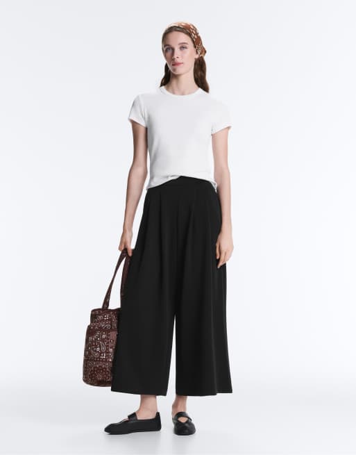 OYSHO - Pantaloni cropped a fondo ampio in modal soft-touch neri con pieghe, 7 di 7