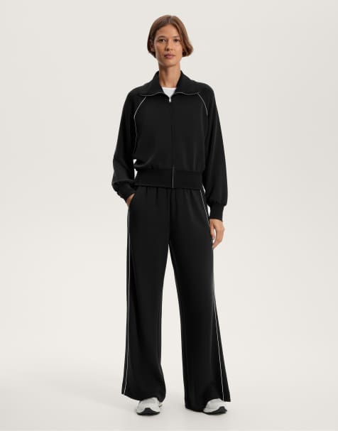 Oysho - Pantaloni dritti a fondo ampio in modal neri con applicazione laterale - view 1