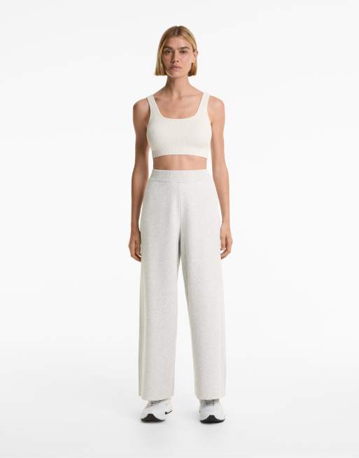 OYSHO - Pantaloni dritti in maglia color grigio pallido mélange con dettaglio laterale a coste
