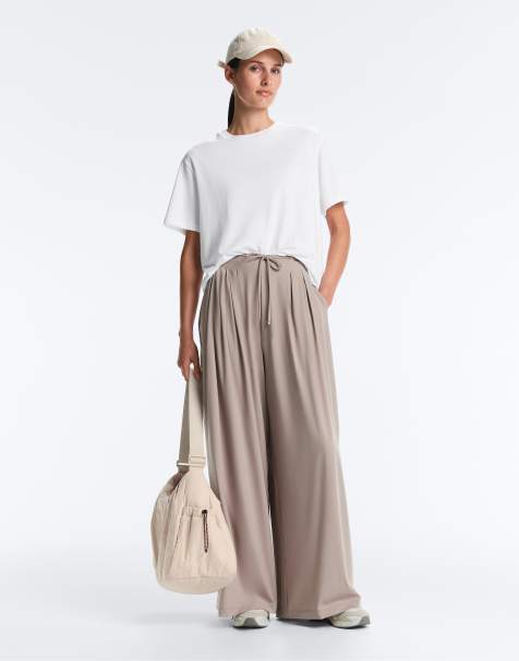 OYSHO - Pantaloni leggeri a fondo ampio color tortora pallido - view 1