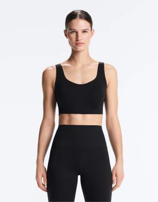 Oysho - Perfect-adapt - Brassière de sport maintien intermédiaire avec bonnets - Noir