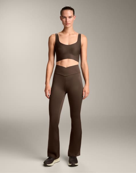 OYSHO Perfect-adapt crossover v-waist flare trousers in brown - view 1