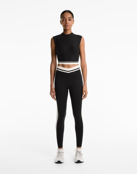 OYSHO – Perfect-Adapt – Knöchellange Leggings in Schwarz mit hohem Bund (65 cm) und Seitenstreifen - view 1
