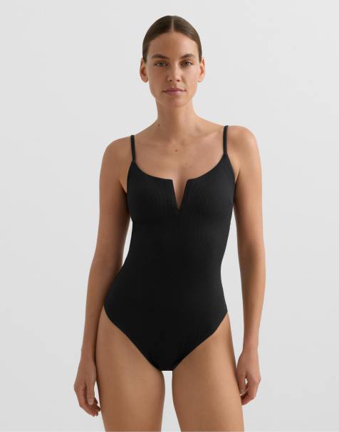 OYSHO Piqué v-neck swimsuit in black - view 1