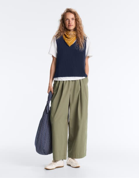 OYSHO Pleated 100% cotton tapered trousers in light khaki