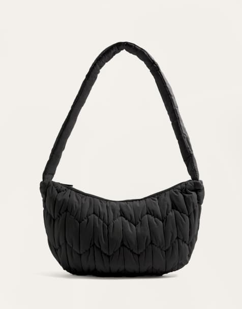 OYSHO Quilted crossbody bag in black - view 1