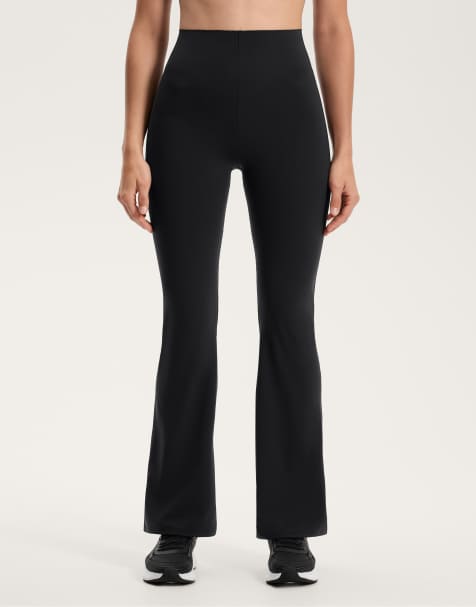 OYSHO Raise up compressive 80cm flare trousers in black