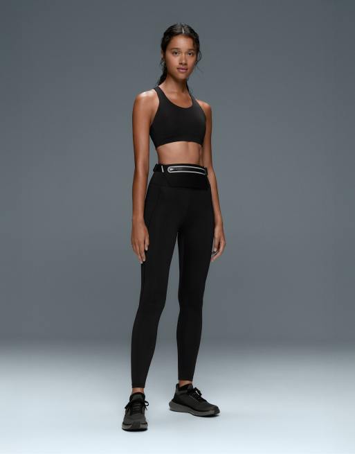 OYSHO Rapid dry medium support sports bra with pockets in black, 2 of 7