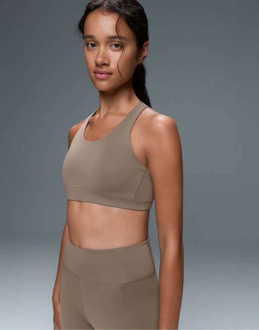 OYSHO Rapid dry medium support sports bra with pockets in brown, 3 of 7