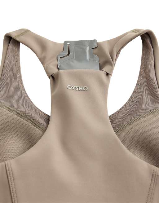 OYSHO Rapid dry medium support sports bra with pockets in brown, 7 of 7