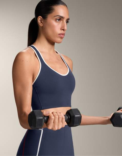 OYSHO - Reggiseno sportivo a sostegno medio a compressione blu navy con coppe in gomma - view 1