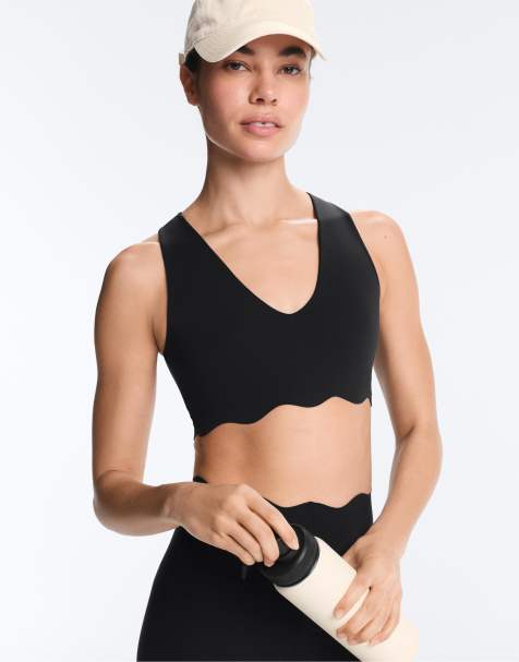OYSHO - Reggiseno sportivo a supporto medio a compressione ondulato nero - view 1
