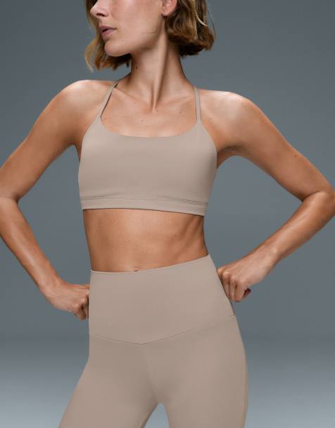 OYSHO reggiseno sportivo Comfortlux a sostegno leggero con spalline incrociate color pietra - view 1