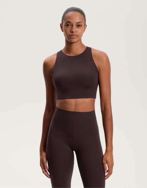 OYSHO - Reggiseno sportivo leggero marrone scuro a sostegno medio