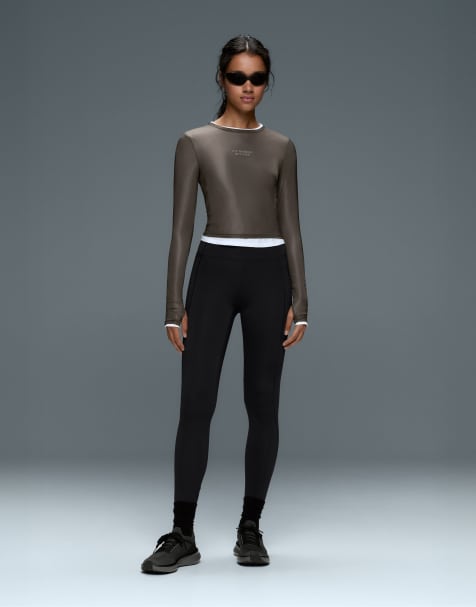 OYSHO schnell trocknende Leggings mit hohem Bund und Taschen in Schwarz - view 1