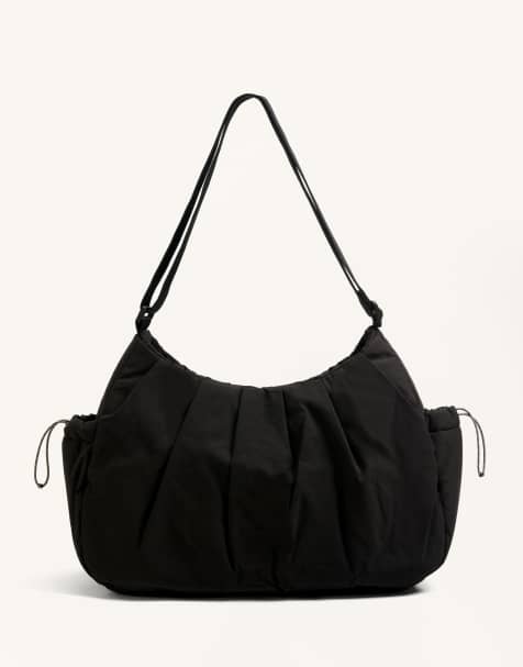 Oysho – Shopper in Schwarz mit seitlichen Taschen - view 1