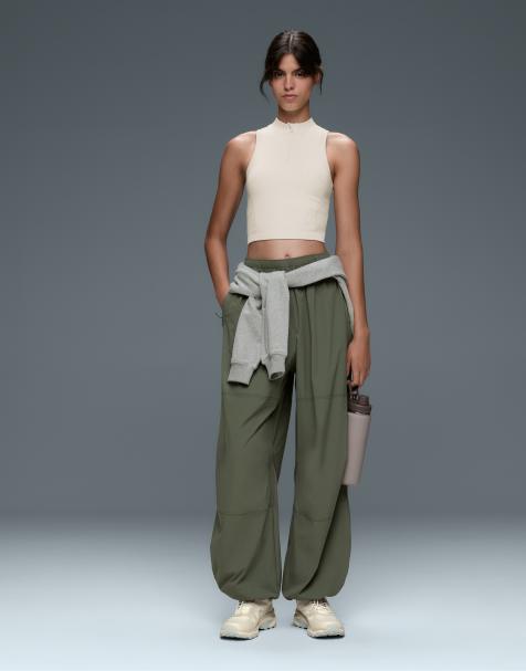 OYSHO Sleeveless seamless rib tank top with half-zip in pale ecru - view 1