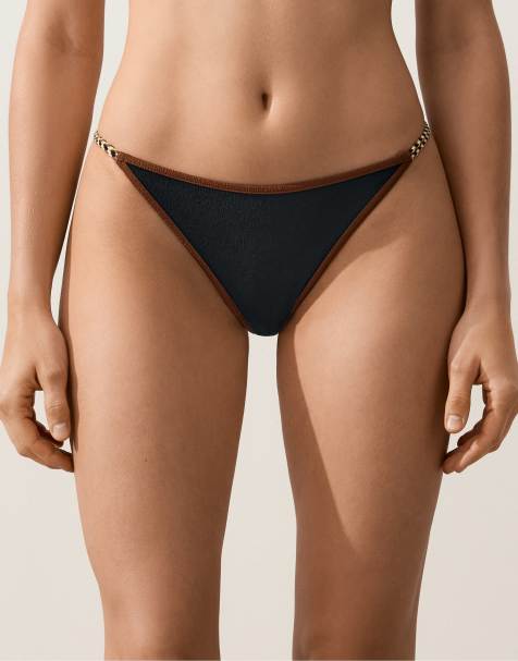 OYSHO - Slip bikini neri a media copertura con laccetti e finiture intrecciate a contrasto - view 1