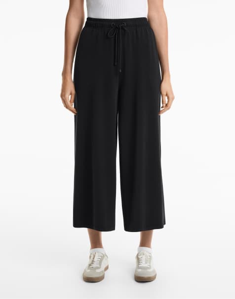 Oysho Soft-touch wide-leg crop trousers with modal in black - view 1