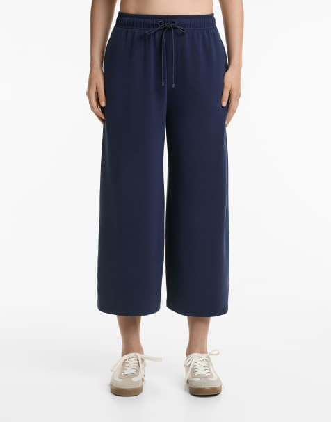 OYSHO Soft-touch wide-leg crop trousers with modal in navy blue