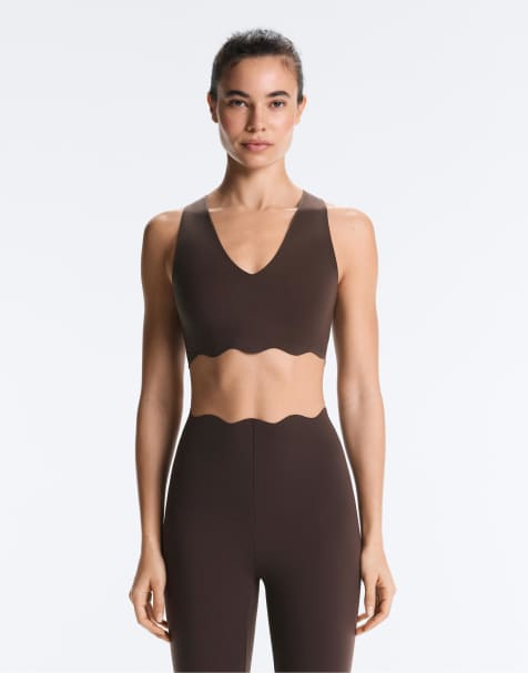 Oysho - Soutien-gorge sport maintien modéré à effet de compression et détail ondulé - Marron - view 1