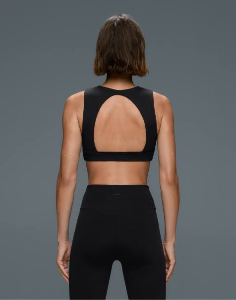 OYSHO sports-BH med medium støtte og åben ryg i sort - view 1