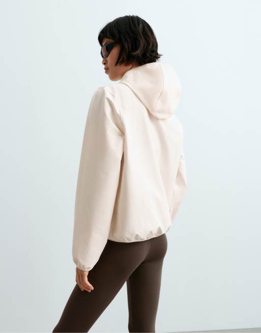 OYSHO stretch teknisk jacka i ljus naturvit, 4 av 5