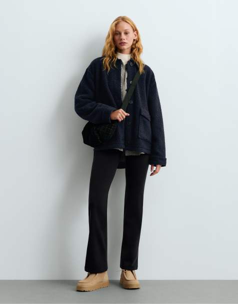 OYSHO Super high rise bootcut extra warm seamless trousers in black - view 1