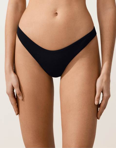 OYSHO – Svart bikiniunderdel i brazilian-modell och pikétyg med U-front - view 1