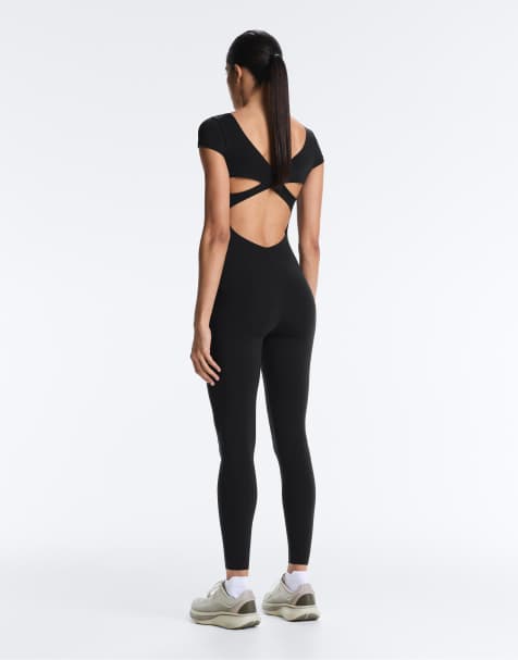 OYSHO – Svart jumpsuit med korta ärmar och kompression - view 1