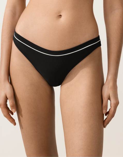 OYSHO – Svart, klassisk bikiniunderdel med kontrastfärgade passpoaler - view 1