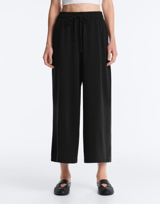 Oysho – Svarta, mjuka, vida byxor i modal med kort design, 3 av 4