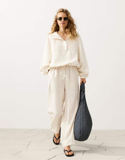 Oysho - Sweat à col zippé en lyocell et 24% lin mélangés avec poche avant - Écru pâle - view 1