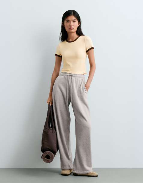 OYSHO t-shirt a maniche corte in misto modal a coste con profili a contrasto color crema - view 1