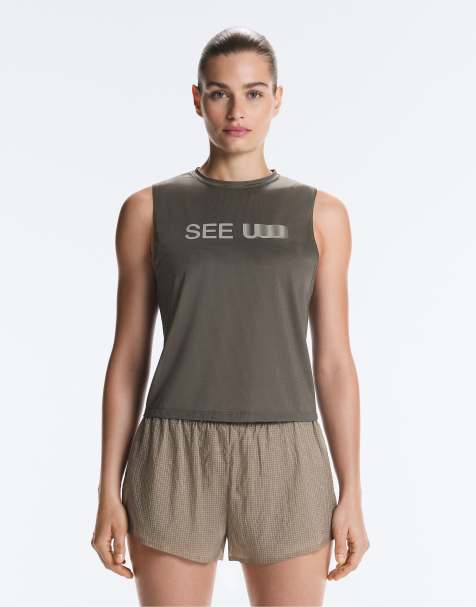 OYSHO - T-shirt tecnica senza maniche grigia con scritta - view 1