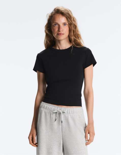 OYSHO – Tailliertes, geripptes T-Shirt aus Baumwollmix in Schwarz - view 1